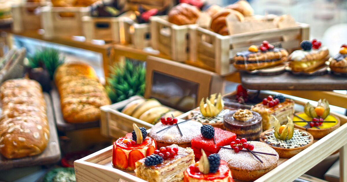 An assortment of freshly baked pastries, cakes and tarts on display in a bakery